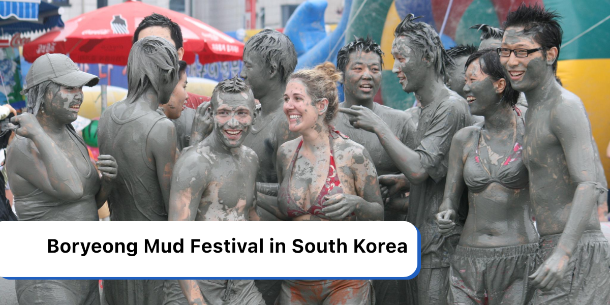 Travelers covered in mud at the Boryeong Mud Festival on Daecheon Beach in South Korea