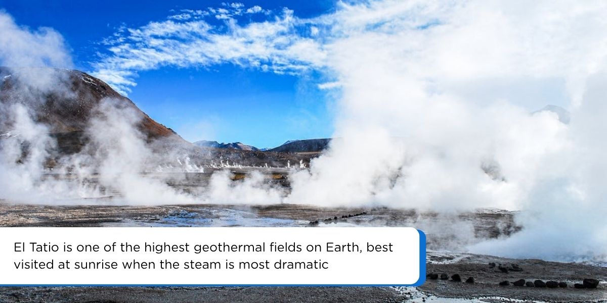 Steam rising from El Tatio geysers at sunrise in the Atacama Desert with tourists in warm clothes