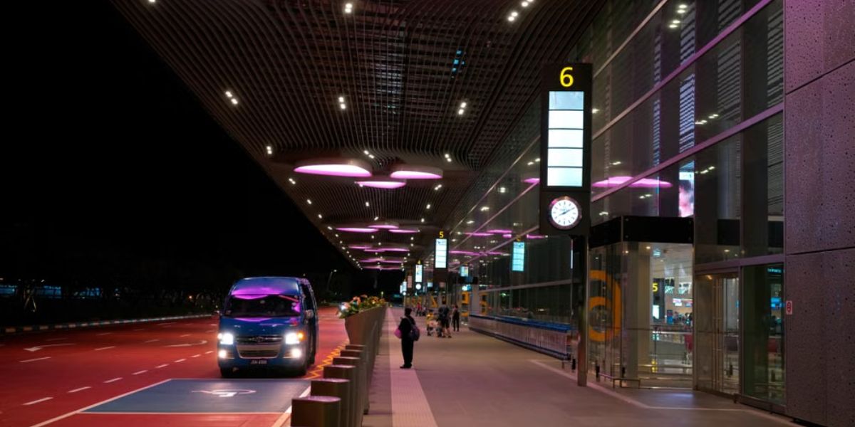 Singapore Changi Airport terminal entrance at night