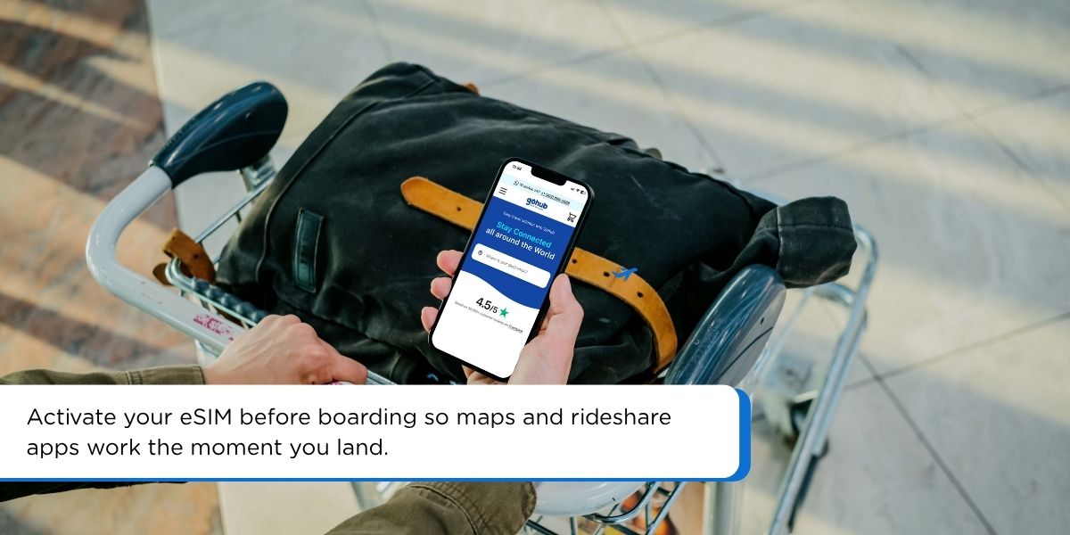 Hand holding a smartphone showing a GPS map on screen