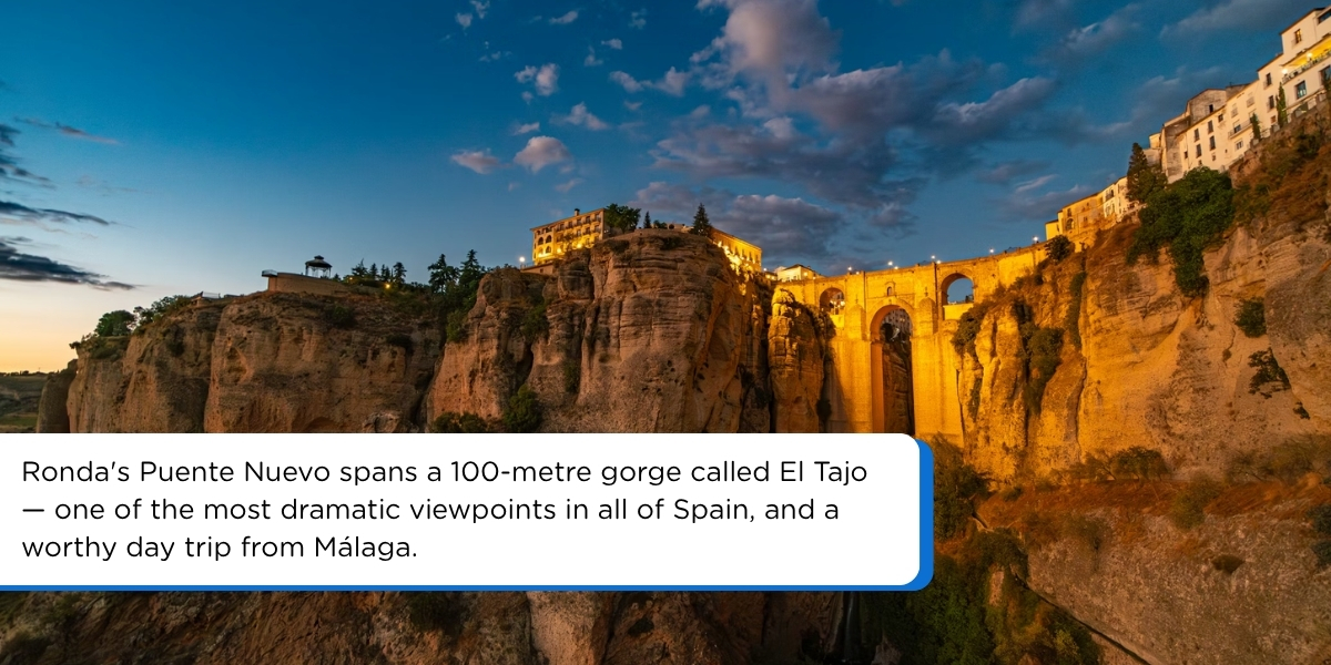 Puente Nuevo bridge illuminated at dusk in Ronda, Spain – optional day trip on southern Spain 7-day itinerary