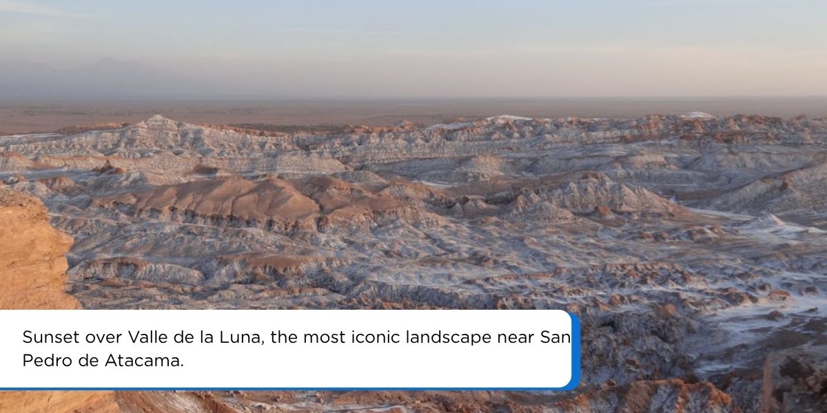 Valle de la Luna near San Pedro de Atacama at sunset with orange sand dunes and rock formations