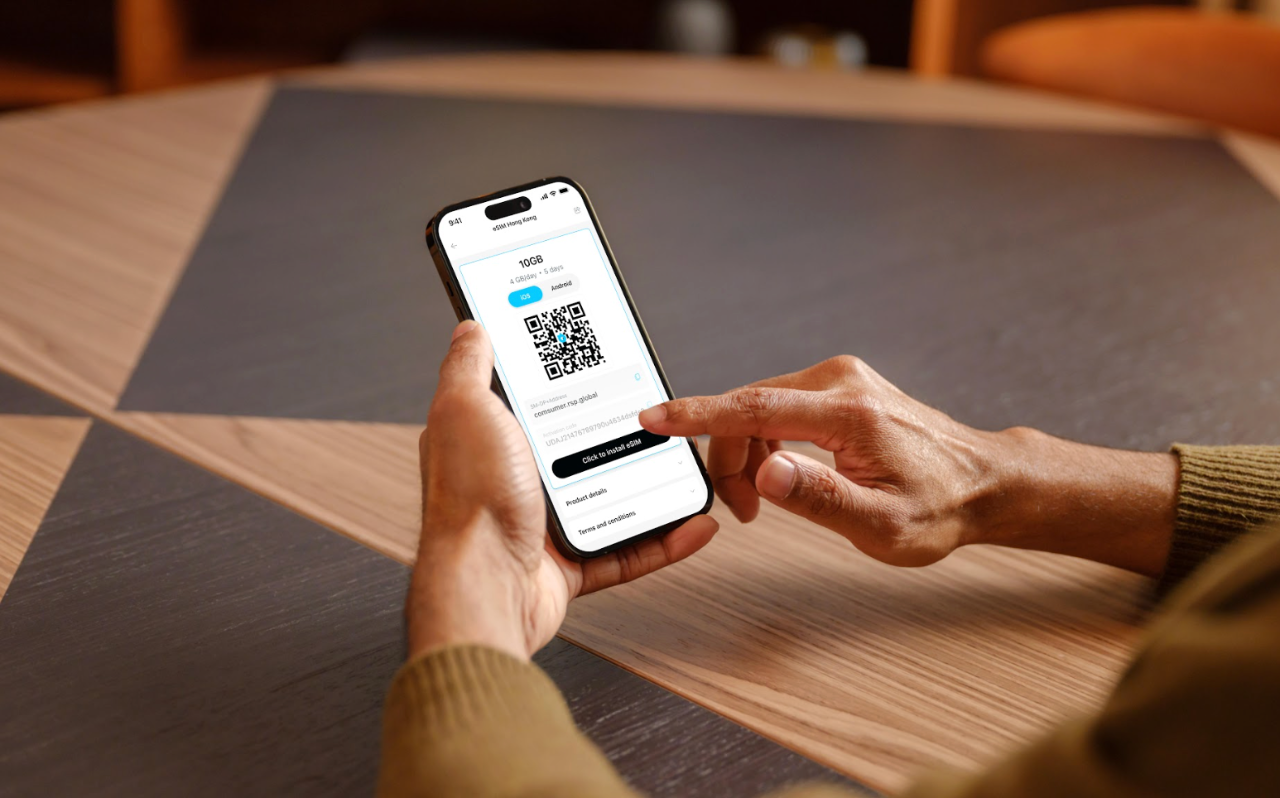 Installing a travel eSIM on a smartphone before flying to Tunisia