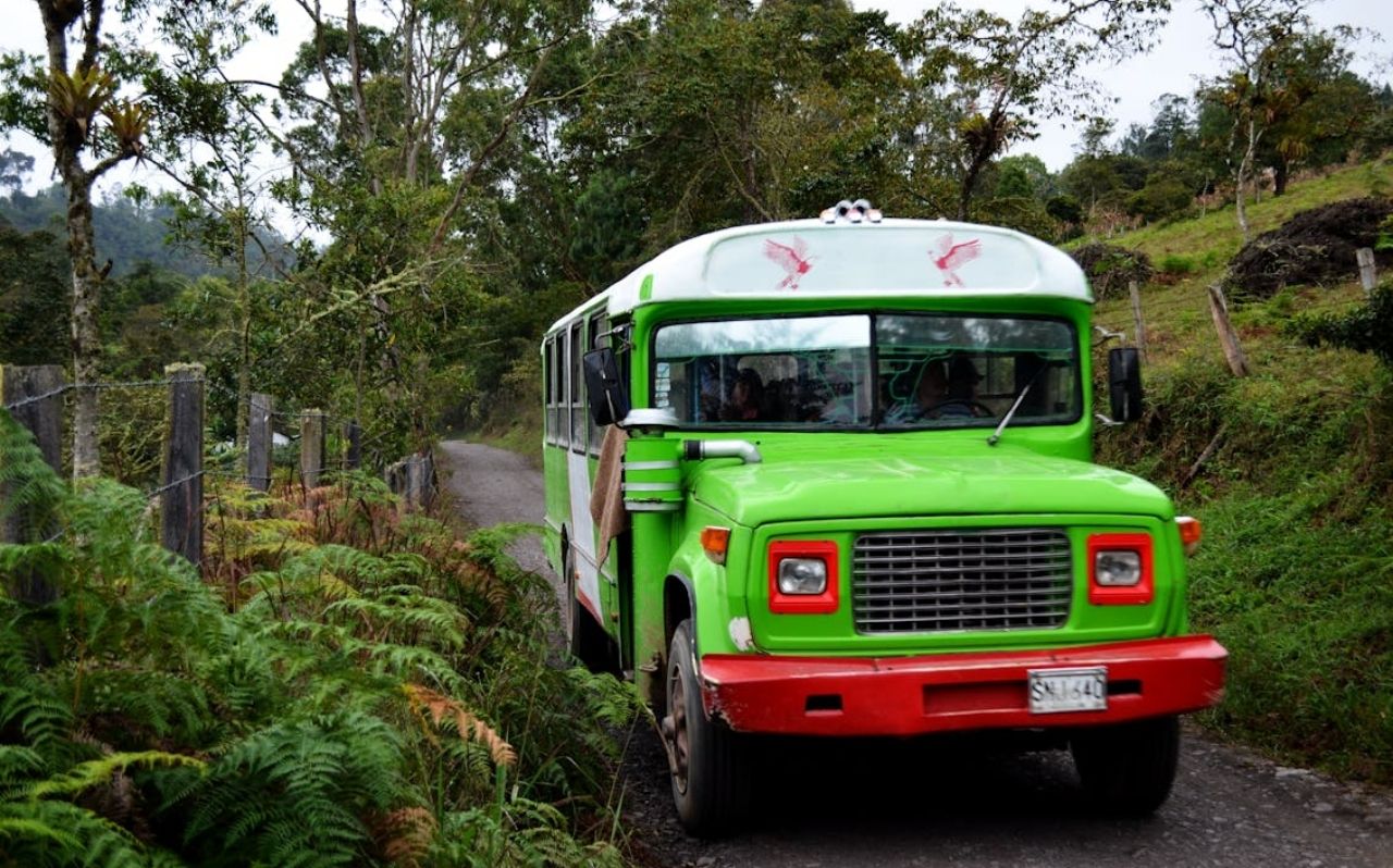 Long-distance bus traveling through the Colombian Andes mountains
