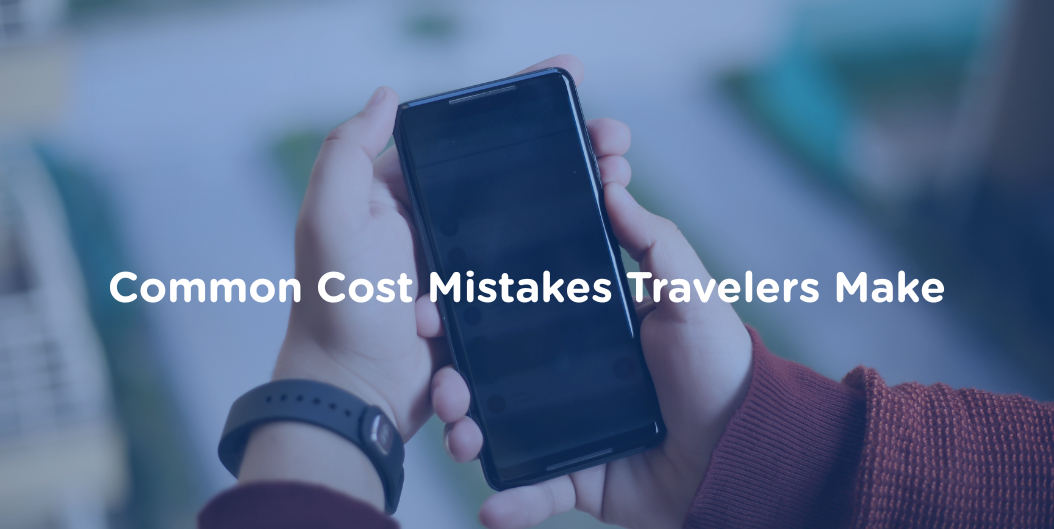 Hands holding a smartphone, representing common mobile connectivity mistakes travelers make