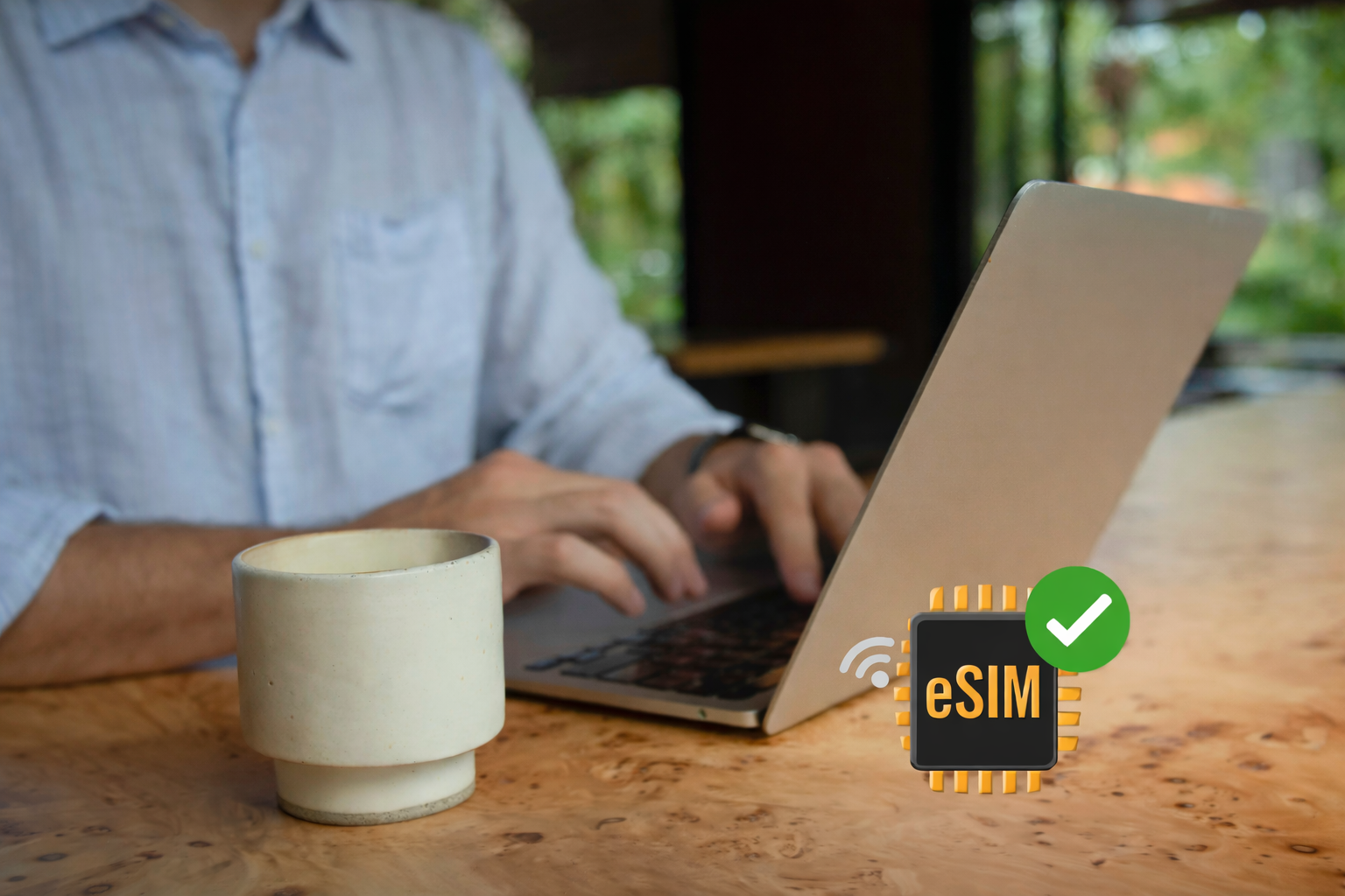 Remote worker using laptop in a café, enabled by stable mobile connection