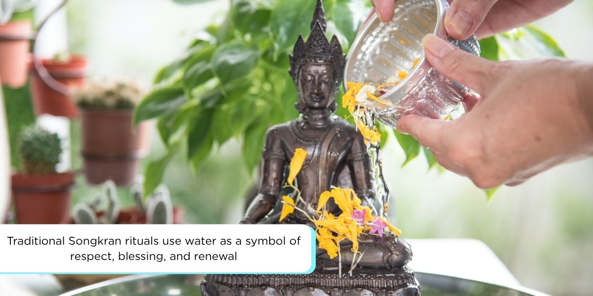 Traditional Songkran water ritual in Thailand showing respect for elders and symbolic cleansing during Thai New Year
